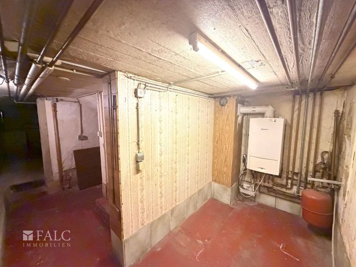 Charmantes Reihenmittelhaus mit Garten in zentraler Lage – Keller
