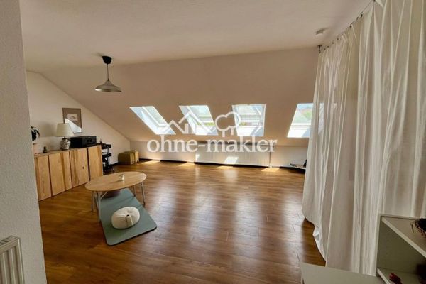 Appartement op de bovenste verdieping met loftkarakter en balkon