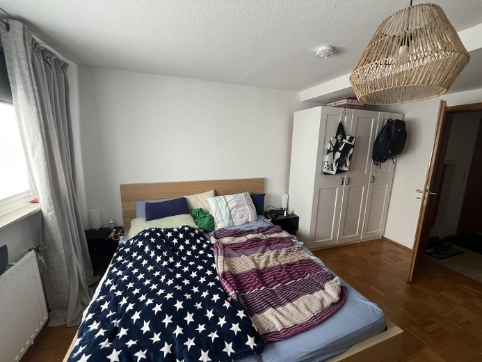 2.5-room attic apartment with large balcony & view of the greenery in Bochum-Harpen – Schlafzimmer