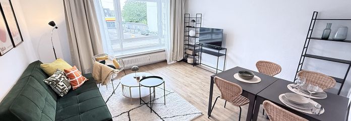 Licht 3-kamerappartement met balkon en ingerichte keuken – vanaf 01.10. – Wohnzimmer mit Essbereich