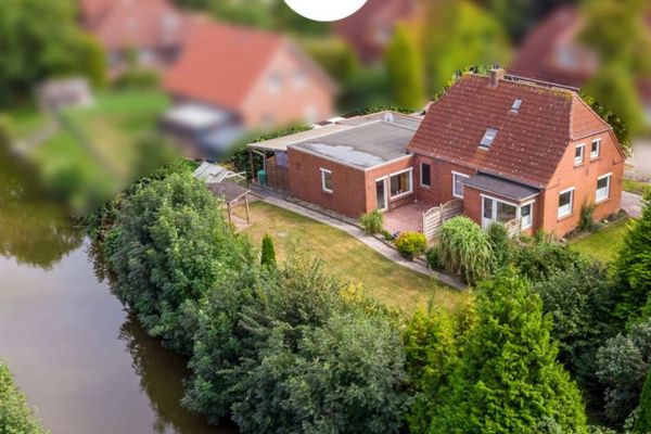 Direkte Kanallage: EFH mit Garage, sichtgeschütztem Garten und potenzieller Einliegerwohnung