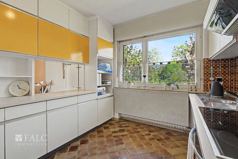 Wohnen mit Perspektive: Einfamilienhaus inklusive Einliegerwohnung auf 878 m² Sonnengrundstück – Küche_EG