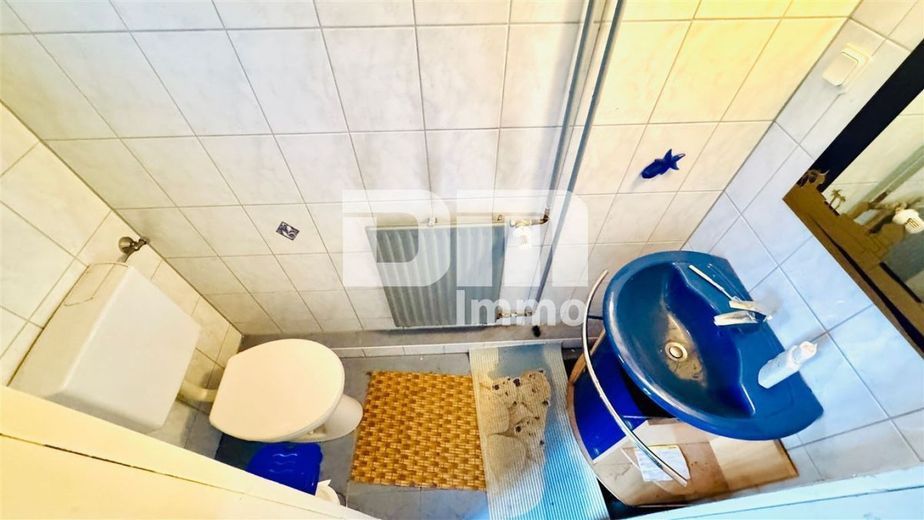 Schöne Doppelhaushälfte in schöner Wohnlage mit Panoramablick, Gartenbereich und Garage – Souterrain WC / Gäste WC