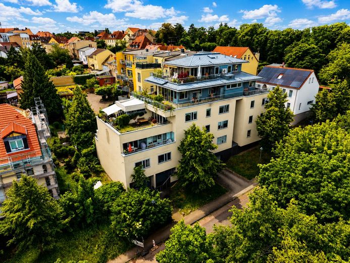 Wohnen auf Hausniveau - außergewöhnliche Eigentumswohnung in Bestlage von Halle-Kröllwitz – Hausansicht