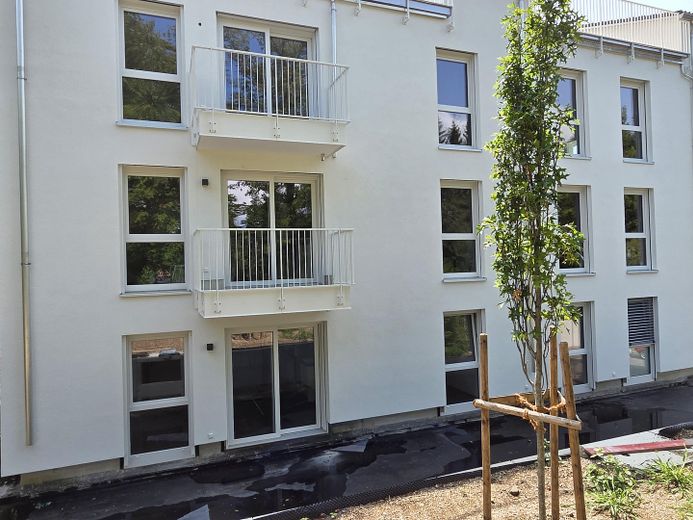 Neubau - Erstbezug - sofort verfügbar! Exklusive 2-Zi-Wohnung mit EBK und Garten sowie Tiefgarage – Aussenansicht