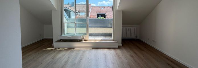 Erstbezug nach Sanierung im Herzen von Unterhaching – Wohnzimmer