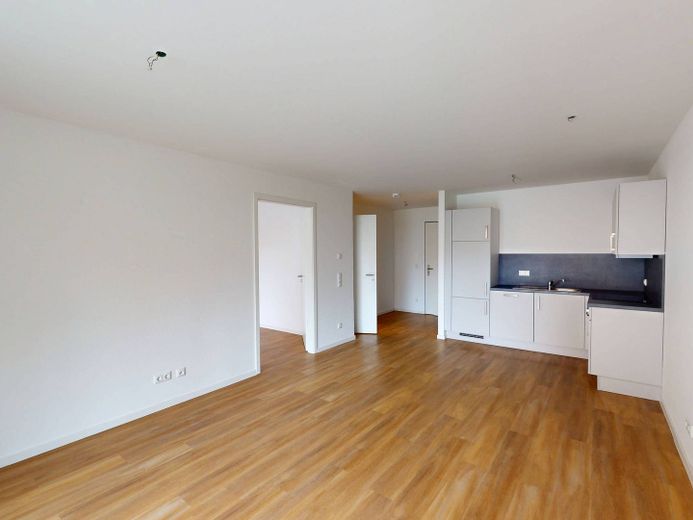2-kamer-nieuwbouwwoning met TERRAS en ingerichte keuken op loopafstand van het Kurpark – Ansicht III: Wohn- und Esszim…
