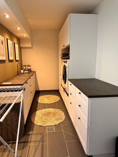 Exklusive Designvilla mit Panoramablick+Einliegerwohnung – Luxus, der Maßstäbe setzt – UG Waschküche
