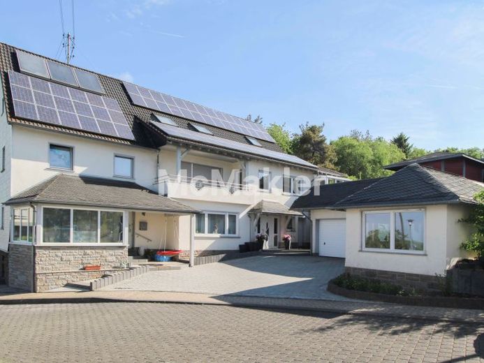 Vielseitiges Zweifamilienhaus mit großem Potenzial in Rödelhausen – Foto 1