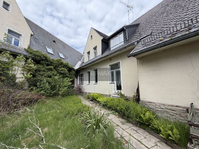 Außergewöhnliches Anwesen mit Wohnhaus, Maisonettewohnungen, Garagenhof und Entwicklungspotenzial – Bild 14