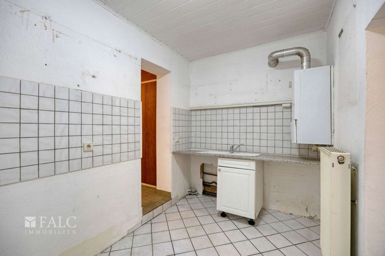 Charmantes sanierungsbedürftiges Einfamilienhaus mit Potenzial in ruhiger Lage von Worringen – Küche