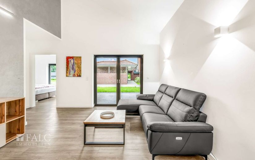 Modernes Ferienhaus am Küstenkanal - Erstbezug in traumhafter Lage – Wohnzimmer