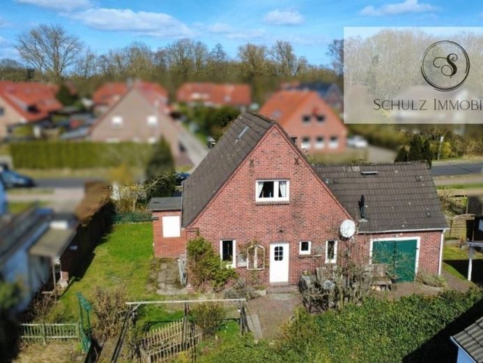 Charmantes Einfamilienhaus mit ca. 132 m² Wohn- und Nutzfläche & Garten in Rüstersiel – Foto 1