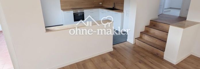 First occupancy after renovation: 2-room apartment with balcony, underground parking space & fitted kitchen