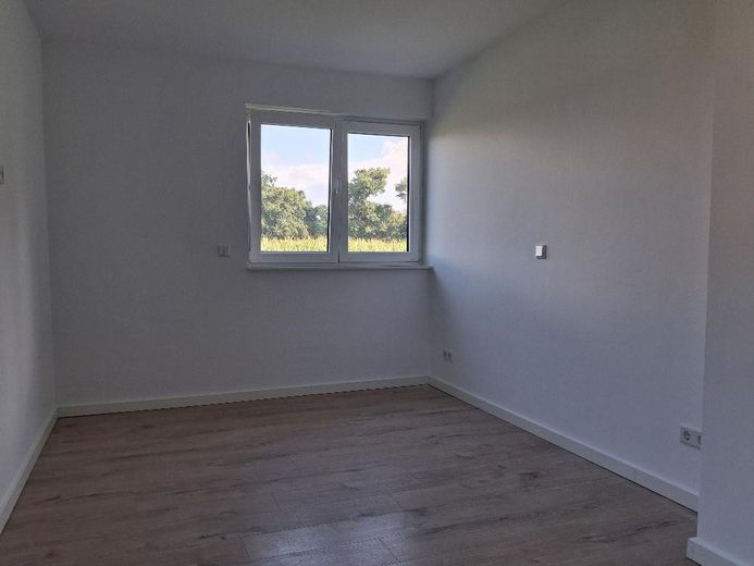 Moderne 3-Zimmer-Erdgeschosswohnung mit Terrasse und Carport in Bad Oeynhausen-Werste – Schlafzimmer