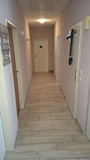 Two-family house – quiet and central with a garden paradise – OG Flur