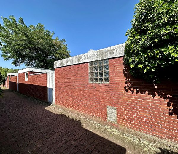 Gartenhof-Reihenhaus in Hannover-Marienwerder – Hintereingang | Geräteschuppen