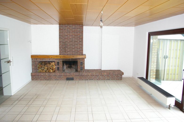 Wohnzimmer mit Kamin