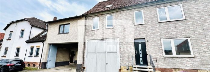 Frontansicht Titel Haus 1 + Haus 2