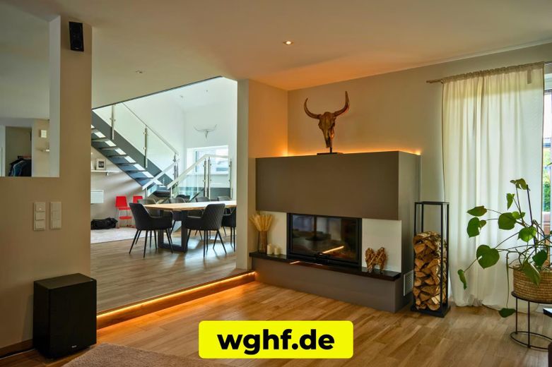 Wohnzimmer mit Kamin
