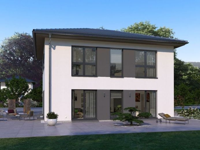MODERNES WOHNHAUS MIT ELEGANTEM WALMDACH – Foto 1