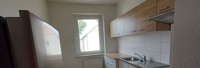 Frisch sanierte Wohnung mit neuer Einbauküche - 2. OG links