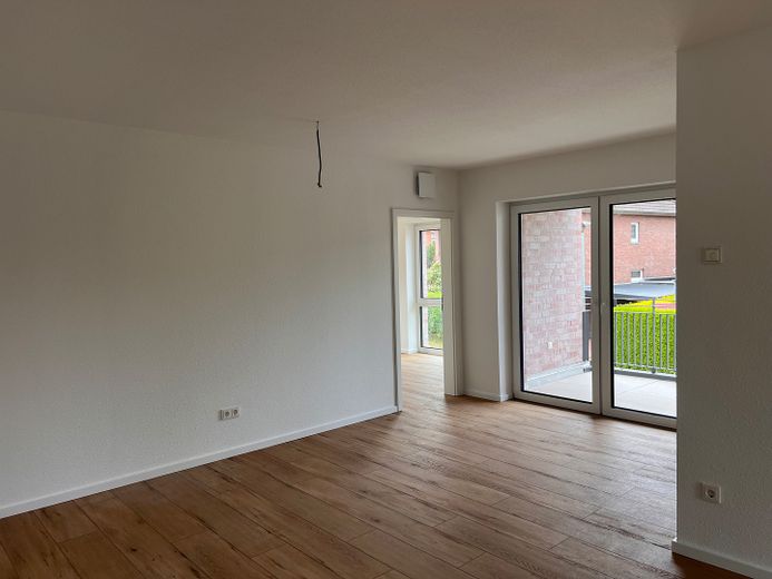 Erstbezug 3-Zimmer-Wohnung an der Stiftsmühle in Aurich – Wohnzimmer / Küche