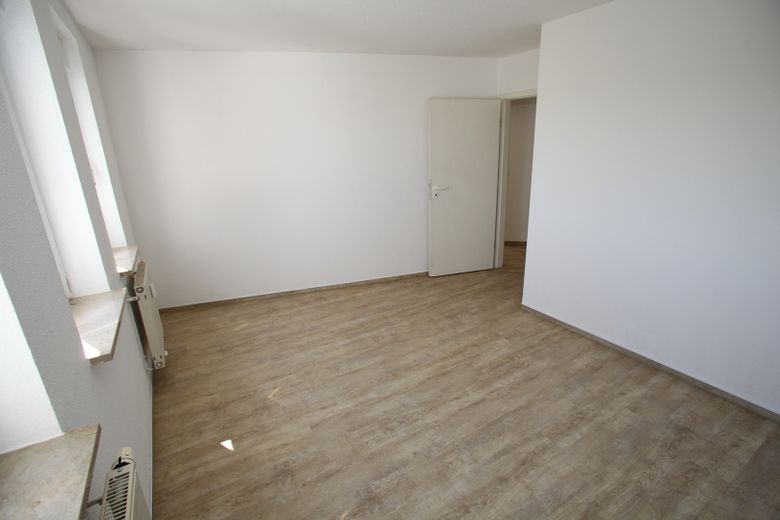 Comfortable 3-room maisonette apartment with balcony and underground garage in Plauen – Schlafzimmer