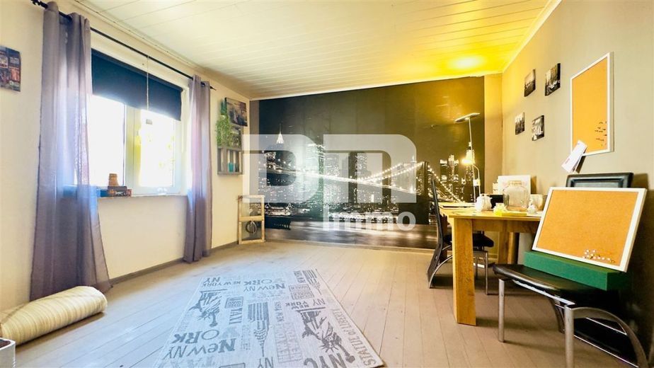 Vielseitiges Raumwunder mit Potenzial: Ein- bis Zweifamilienhaus im Herzen von Amt Creuzburg – EG Wohnzimmer / Esszimmer