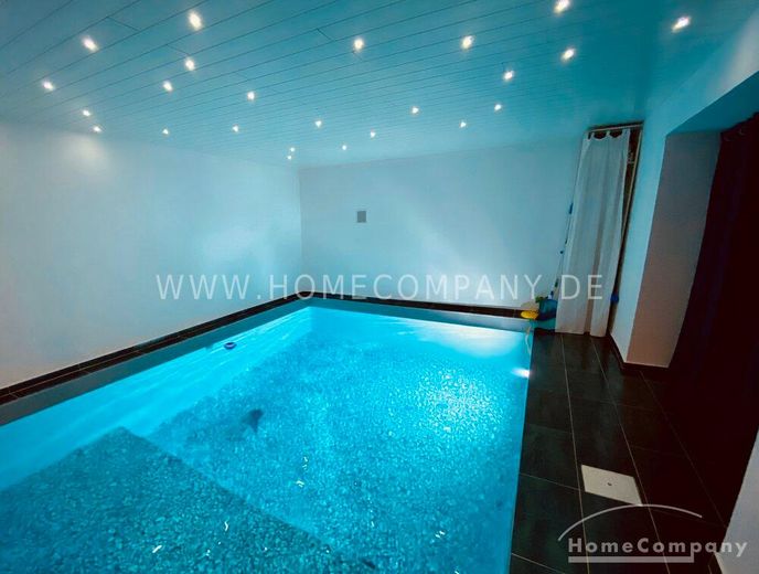 Außergewöhnlicher Designer-Bungalow mit Indoor-Pool, Heimkino  &  Smart-Home in ruhiger Naturlage – 799614f72a6a788f8d16ca050fa24b791060e24f.jpg