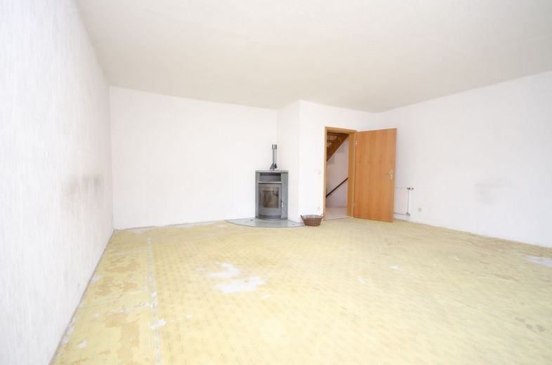 Wohnzimmer mit Kamin