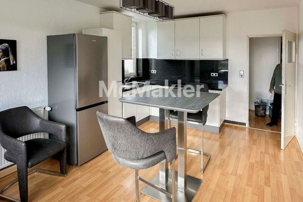 Furnished, well-maintained 53 m² apartment in a quiet location, with fitted kitchen, balcony and parking space - advantage: leasehold