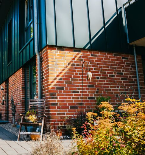 Neubau-Erstbezug: 5 Zimmer Reihenhaus, 110 m², Garten, Terrasse, Wallbox in Neumünster-Gadeland – Außenansicht
