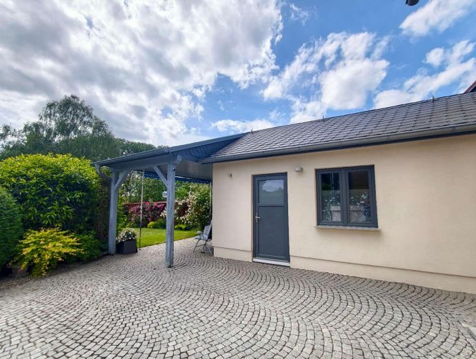 Effizienzhaus A am Kummerower See – Wärmepumpe, PV, Pool, Sauna & nah zum Hafen – Garage mit Freisitz