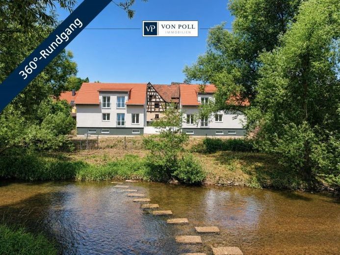 Wohnen am Fluss: Modernes Neubau-Massivhaus in begehrter Uferlage mit Panoramablick – Foto 1