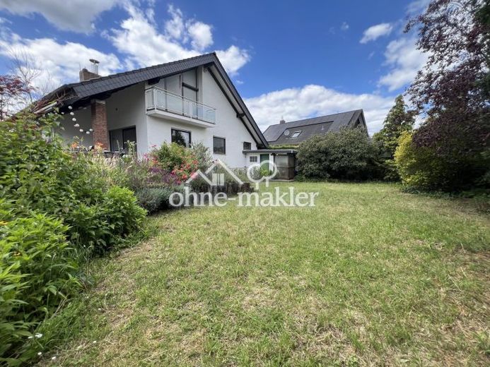 Hell und großzügig geschnitten - Freistehendes Einfamilienhaus mit Garten und Kamin – Foto 1