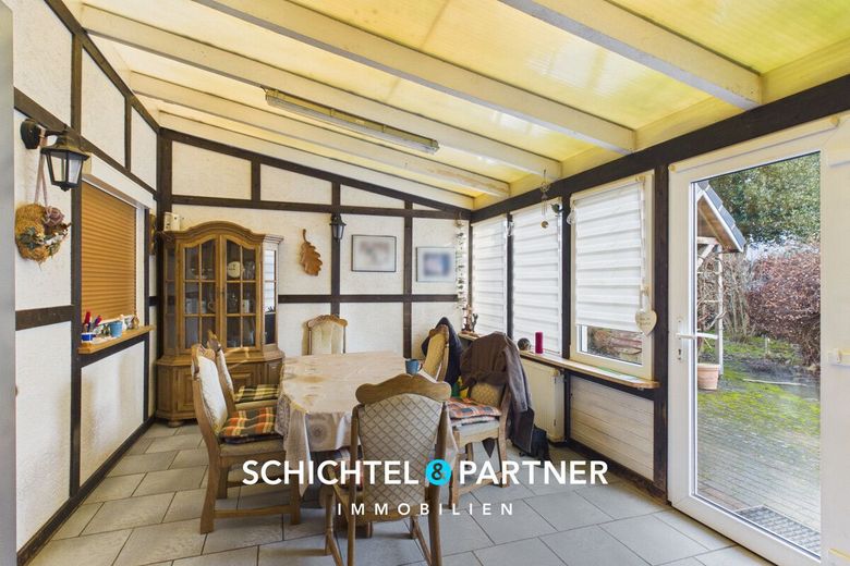 Hambergen | Freistehendes Einfamilienhaus mit Kamin und großem Grundstück – S&amp;P | Wintergarten