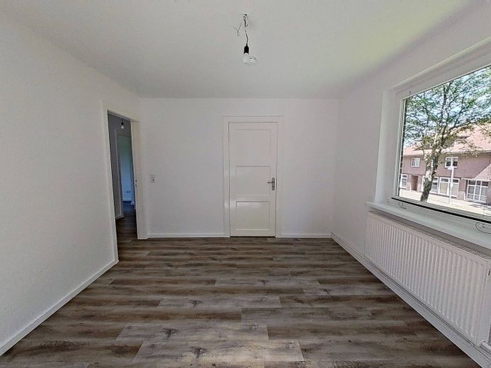 Moderne 2-Zimmer-Wohnung mit Wannenbad in ruhiger Wohnlage – Ansicht II: Wohn- und Esszimm…
