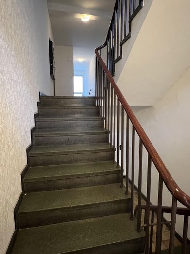 Treppenaufgang vor der Wohnung