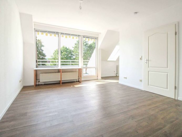 Helle und gepflegte Dachgeschosswohnung in der Residenz Magnushof in Malente – Foto 1