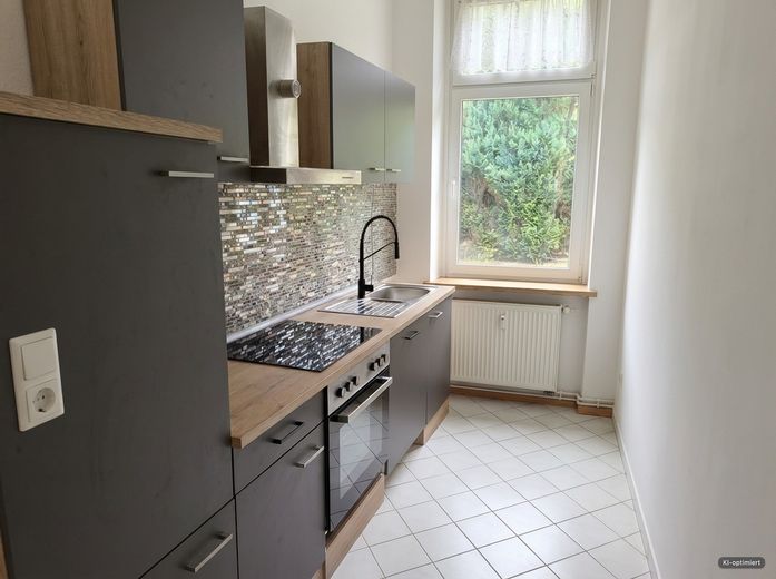 Schöne 2-Zimmer-Wohnung mit Einbauküche im Erdgeschoss – Foto 3