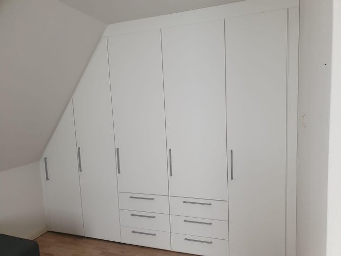 Schlafzimmer mit Einbauschrank