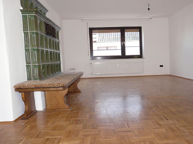 Wohnzimmer mit Kachelofen