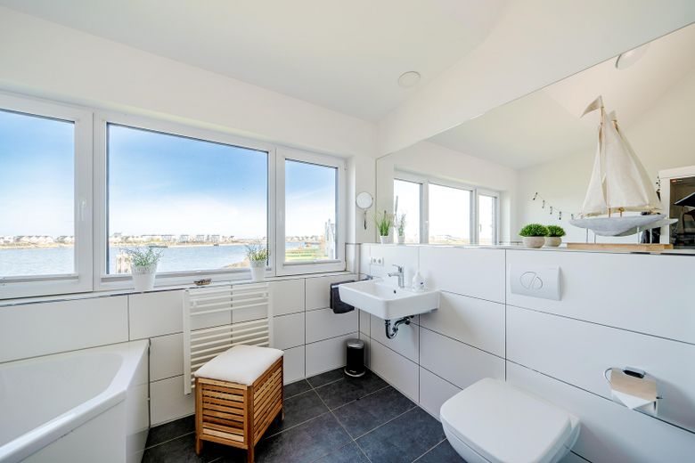 Semi-detached house in the Baltic Sea resort Olpenitz Kappeln, waterside location with large plot – Bad oben