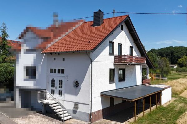 Gepflegte Doppelhaushälfte mit Garage, Terrasse und einem großem Garten in Heusweiler-Holz