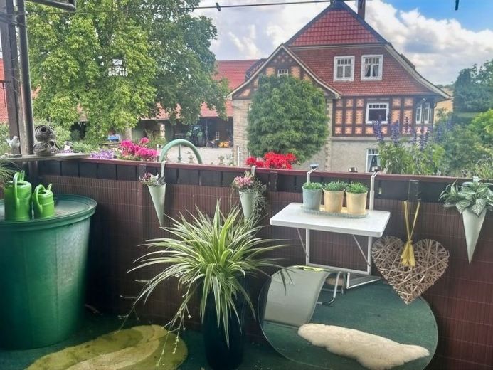 Sibbesse-Westfeld: Charmante Doppelhaushälfte mit Balkon und Garage – Foto 1