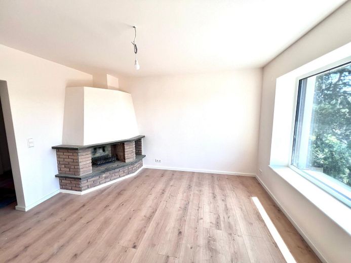 Erstbezug Möhringen: Stilvolle 3,5-Zi.-Etagenwohnung mit Kamin, Balkon & Garten – Kaminbereich