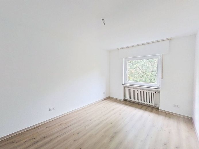 Luminoso bilocale ben distribuito con BALCONE e bagno con vasca a Bielefeld-Senne – Ansicht I: Schlafzimmer