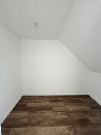 Najwyższej klasy nowe mieszkanie (dwupoziomowe) w Osnabrück-Sonnenhügel – z tarasem na dachu + balkonem i miejscem parkingowym – Schlafzimmer Ankleidezimmer