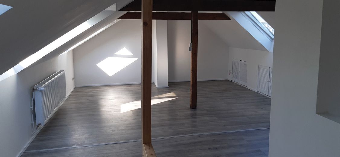 Ausgefallene Altbau-Wohnung – Spitzboden